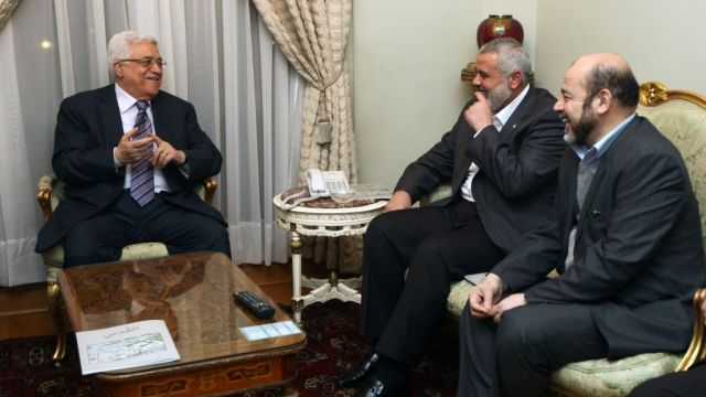محمود عباس وهنية